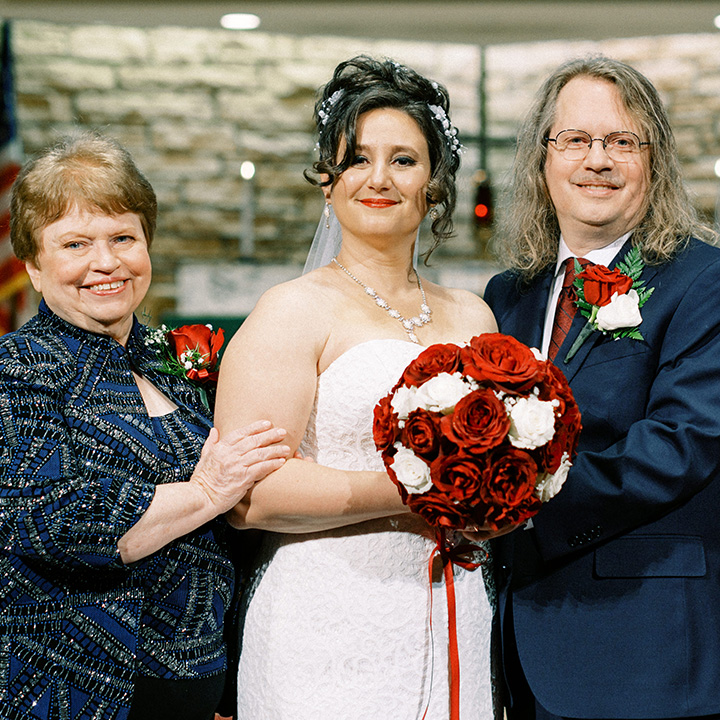 Irina and Tim at their wedding with Irina's mother